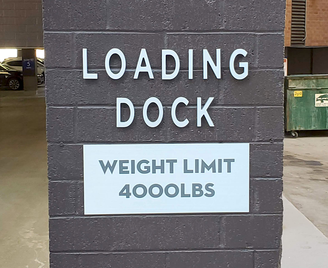 55 Madison and 44 Cook loading dock sign