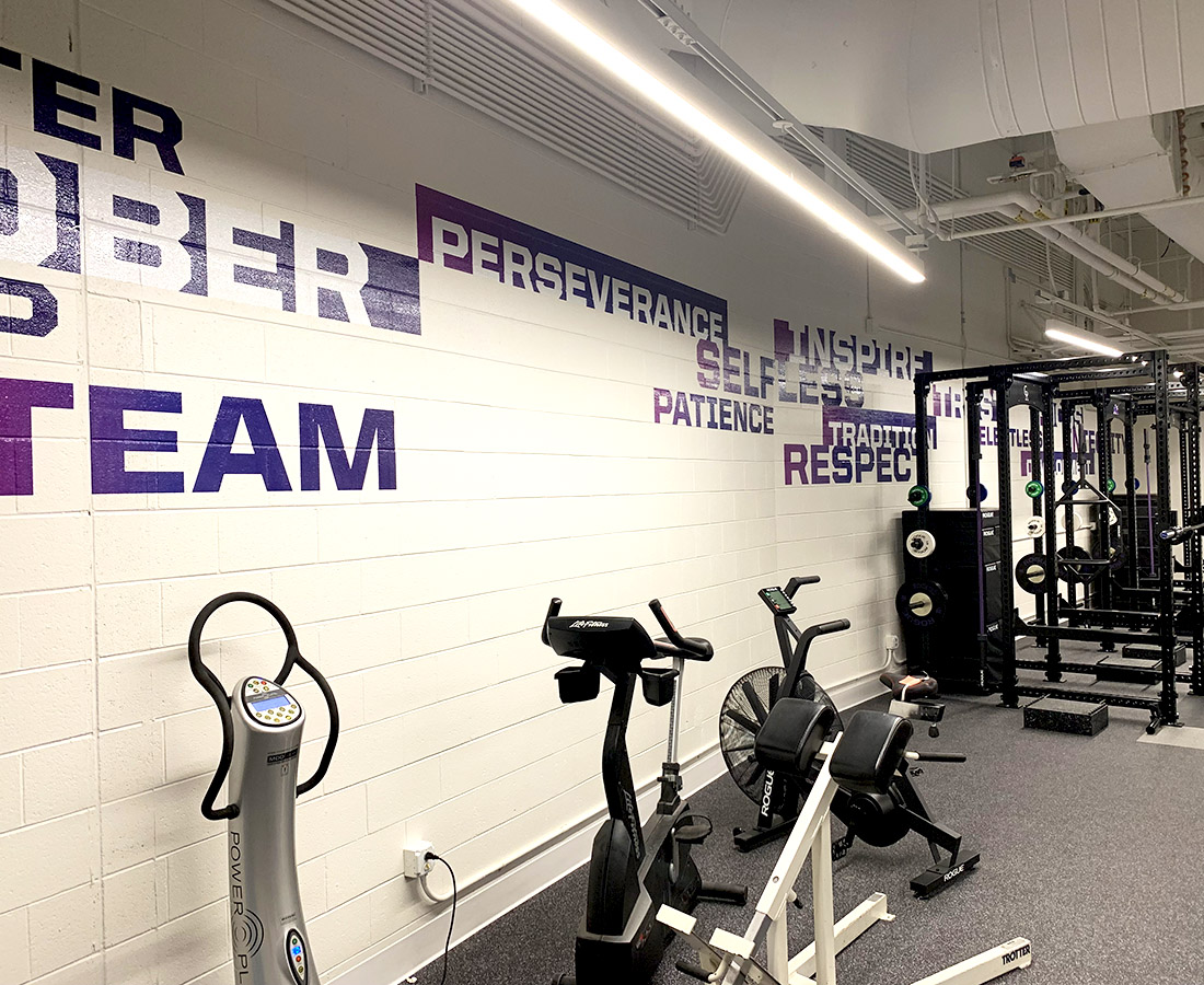 Purple vinyl wall graphics at the Colorado Rockies Clubhouse fitness center at Coors Field
