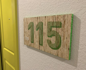 Colab Apartments interior unit ID green kirei board