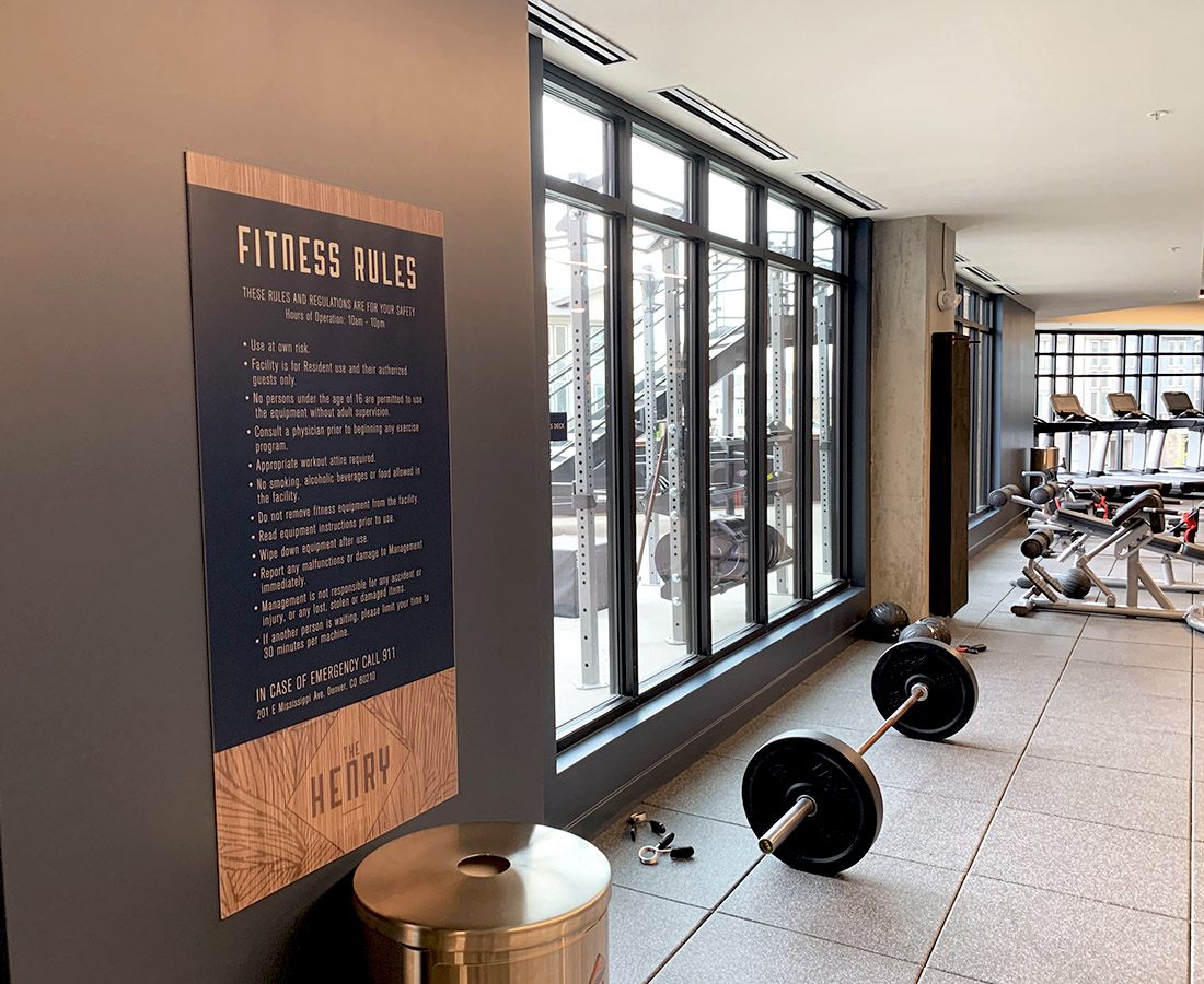 The Henry interior fitness center rules sign
