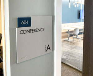 Interior ADA room ID sign in building A at Denver Water