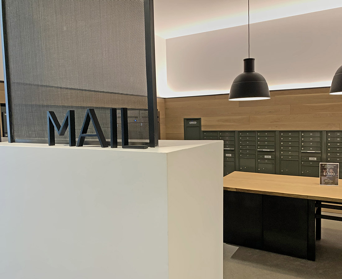 Interior acrylic letters for Mail room at Modera LoHi