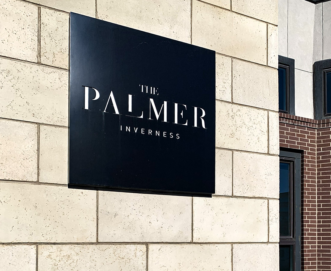 Exterior building ID with cutout letters at The Palmer