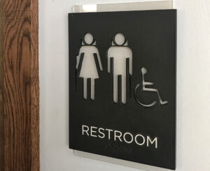 Interior restroom sign at Alliance Residential Montane