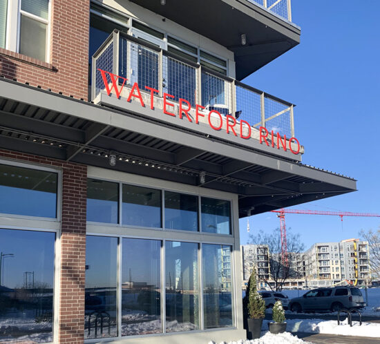 Exterior leasing address signage at Waterford RiNo