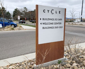 Cycle Apartments directional monument sign