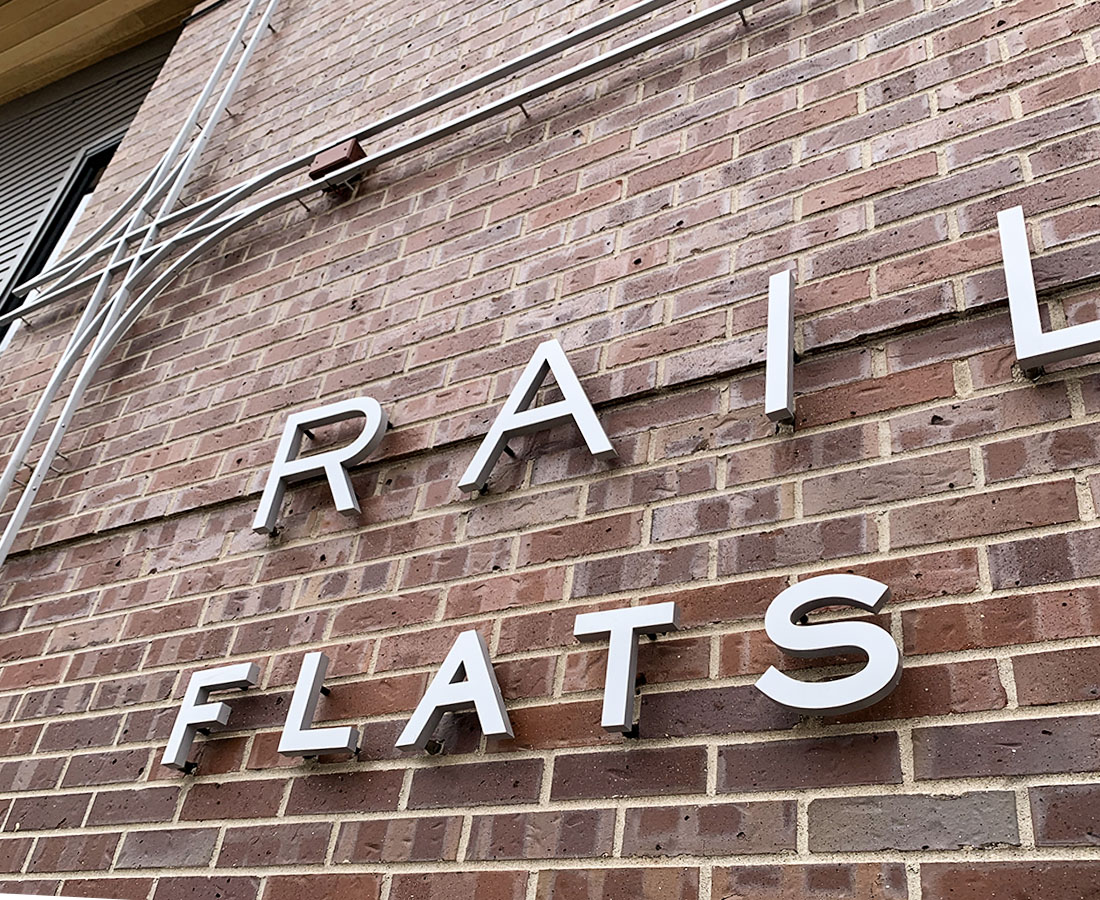 Railway Flats exterior sign close up